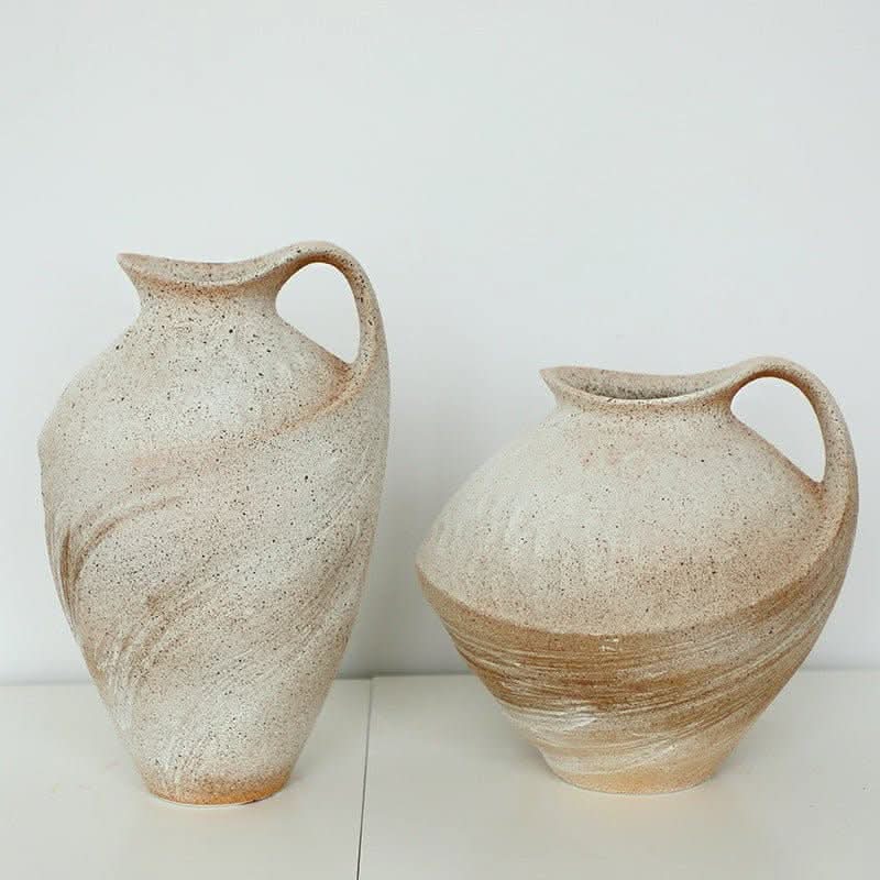 Wabi-sabi clay pot with painterly brush strokes in beige and tan. Home decor.